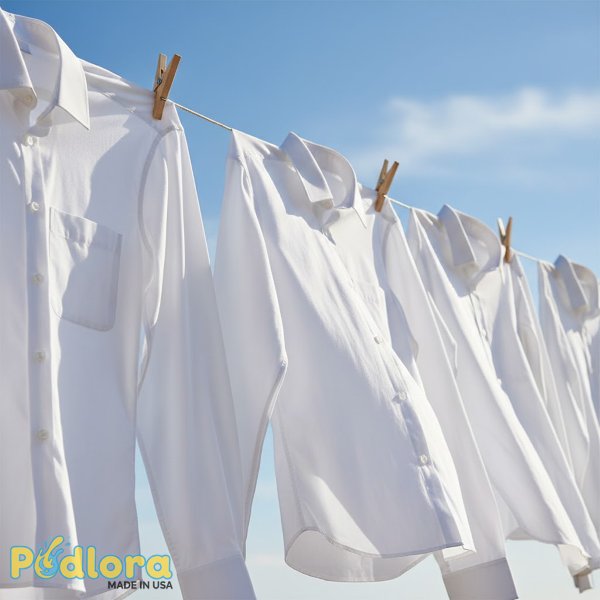 White Shirts Hanging To Air Dry Outdoors White Shirts Hanging To Air Dry Outdoors